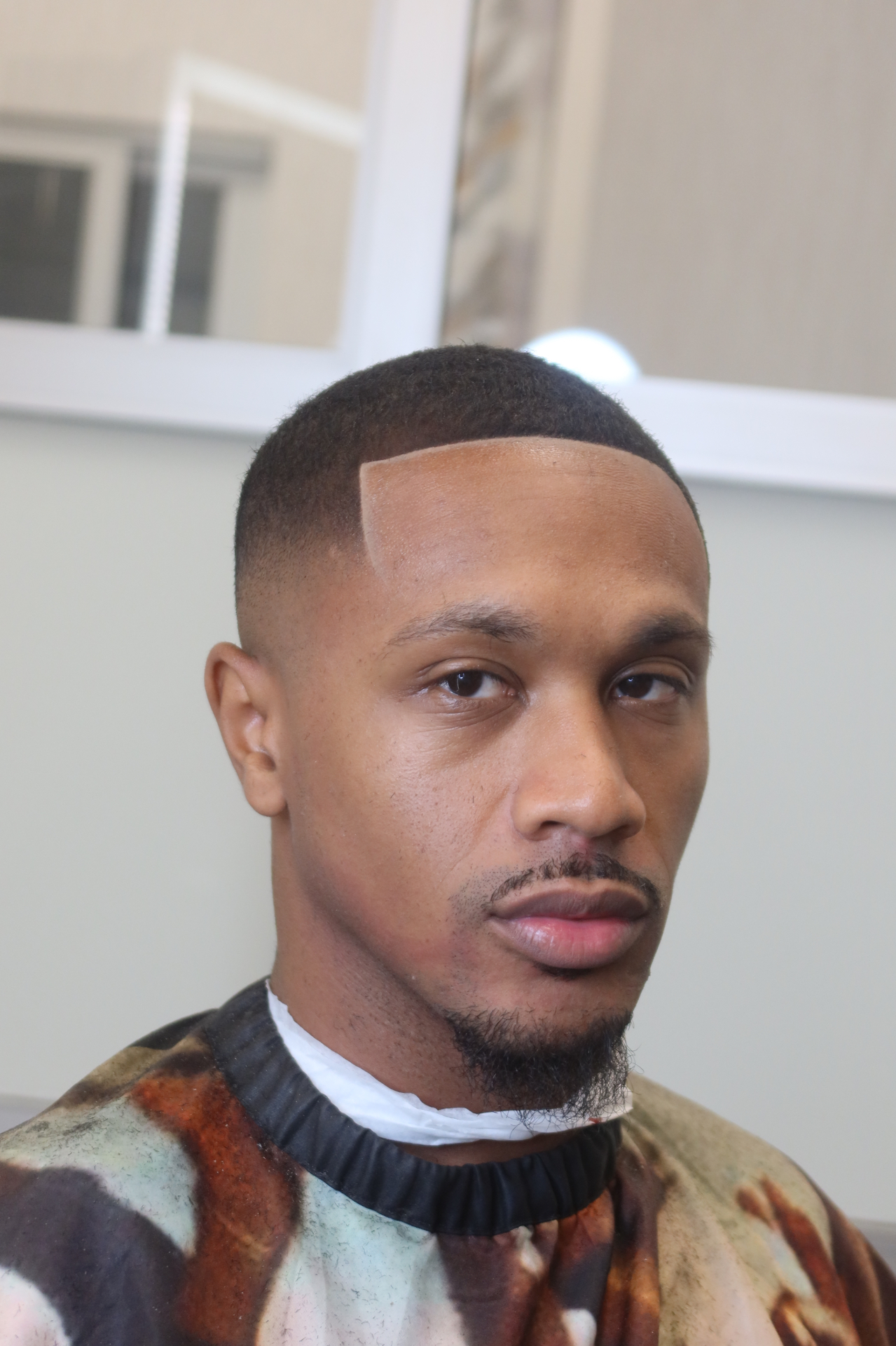 Fresh fade with hard part